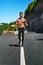 Handsome Muscular Man Running And Exercising Outdoors. Sport, Fitness