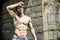 Handsome, muscular young construction worker shirtless