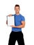 Handsome personal trainer with clipboard