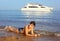 Handsome preteen sun tanned boy swimming on the Res sea beach an