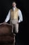 A handsome Regency gentleman wearing a gold waistcoat