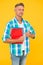 Handsome school or university teacher. thumb up. adult man student holding notebooks. man with folder yellow background