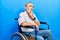 Handsome senior man with beard sitting on wheelchair thinking worried about a question, concerned and nervous with hand on chin