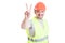 Handsome smiling workman or constructor with helmet showing victory sign
