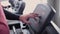 Handsome sports man sets up a treadmill.