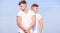 Handsome strong twins. Men strong muscular athlete bodybuilder posing confidently in white shirts. Sport lifestyle and