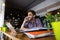 Handsome student studying in restaurant