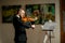 Handsome talented violinist play on classic musical instrument