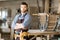 Handsome woodworker posing for photography