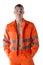 Handsome young construction worker with orange suit