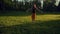 Handsome young girl jumping and dancing outdoor in a park