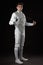 Handsome Young male fencer in white fencing costume