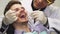 Handsome young man smiling during dental examination