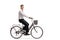 Handsome young man in a tux riding a bicycle
