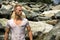 Handsome young muscle man standing, wearing wet white t-shirt