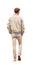 handsome young red haired man walking away with his hands in his pockets. Rear view. Transparent PNG file.