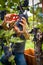 Handsome young vintner harvesting vine grapes in his vineyard