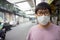 HandsomeMan wearing face mask protect filter against air pollution PM2.5 or wear N95 mask. protect pollution, anti smog and