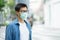 HandsomeMan wearing face mask protect filter against air pollution PM2.5 or wear N95 mask. protect pollution, anti smog and