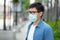 HandsomeMan wearing face mask protect filter against air pollution PM2.5 or wear N95 mask. protect pollution, anti smog and