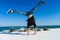 Handstand at the beach