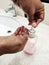 Handwashing with soap and water bubbles all over hands .