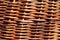 Handwoven wicker basket closeup as background