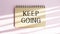 Handwriting Announcement text showing Keep Going. Business concept for Go Moving Forward Letting written on notebook