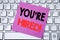 Handwriting Announcement text showing You Are Hired. Business concept for Hiring Employee Worker written on sticky note paper on t