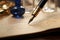 Handwriting focus close up of a womans hand using a fountain pen