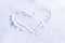 Handwriting heart shaped on snow