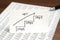 Handwriting stairs heading upwards with arrow on paper. Business success concept and growth idea.
