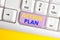 Handwriting text Action Plan. Concept meaning list of things or schedule to be made thia current year White pc keyboard