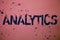 Handwriting text Analytics. Concept meaning Data Analysis Financial Information Statistics Report Dashboard Ideas messages pink ba