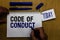 Handwriting text Code Of Conduct. Concept meaning Ethics rules moral codes ethical principles values respect Man holding marker no