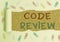 Handwriting text Code Review. Concept meaning single most effective technique for identifying security flaws Paper clip