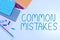 Handwriting text Common Mistakes. Business overview actions that are often used interchangeably with error