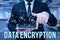 Handwriting text Data Encryption. Business showcase Symmetrickey algorithm for the encrypting electronic data Man In