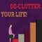 Handwriting text De Clutter Your Life. Concept meaning remove unnecessary items untidy or overcrowded places Businessman