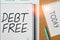 Handwriting text Debt Free. Business concept Financial freedom Not owing any money Successful Business