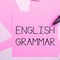 Handwriting text English Grammar. Business overview courses cover all levels of speaking and writing in english