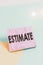 Handwriting text Estimate. Concept meaning roughly calculate judge value number quantity extent of something Paper placed tilted