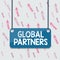 Handwriting text Global Partners. Concept meaning Two or more firms from different countries work as a team Board color background