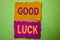 Handwriting text Good Luck. Concept meaning Lucky Greeting Wish Fortune Chance Success Feelings Blissful written on Tear Papers on