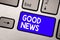 Handwriting text Good News. Concept meaning Someone or something positive,encouraging,uplifting,or desirable Keyboard blue key Int