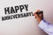 Handwriting text Happy Anniversary Motivational Call. Concept meaning Annual Special Milestone Commemoration Advisors hand holding