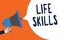 Handwriting text Life Skills. Concept meaning that is necessary or desirable full participation in everyday Man holding megaphone