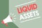 Handwriting text Liquid Assets. Concept meaning Cash and Bank Balances Market Liquidity Deferred Stock Megaphone loudspeaker green