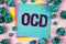 Handwriting text Ocd. Concept meaning Obsessive Compulsive Disorder Psychological Illness Medical Condition written on Sticky Note