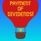 Handwriting text Payment Of Dividends. Concept meaning Distribution of profits by the company to shareholders Hu